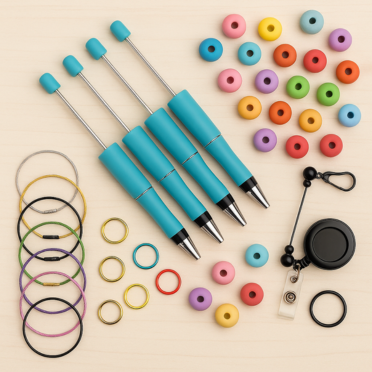 Set of blue pens with various colorful accessories on a beige background